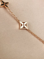 „Dream“-Armband mit Stern-, Sonnen- und 7 Motiven in Gold