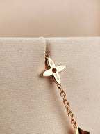 „Dream“-Armband mit Stern-, Sonnen- und 7 Motiven in Gold