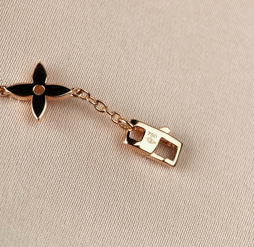 „Dream“-Armband mit Stern-, Sonnen- und 7 Motiven in Gold