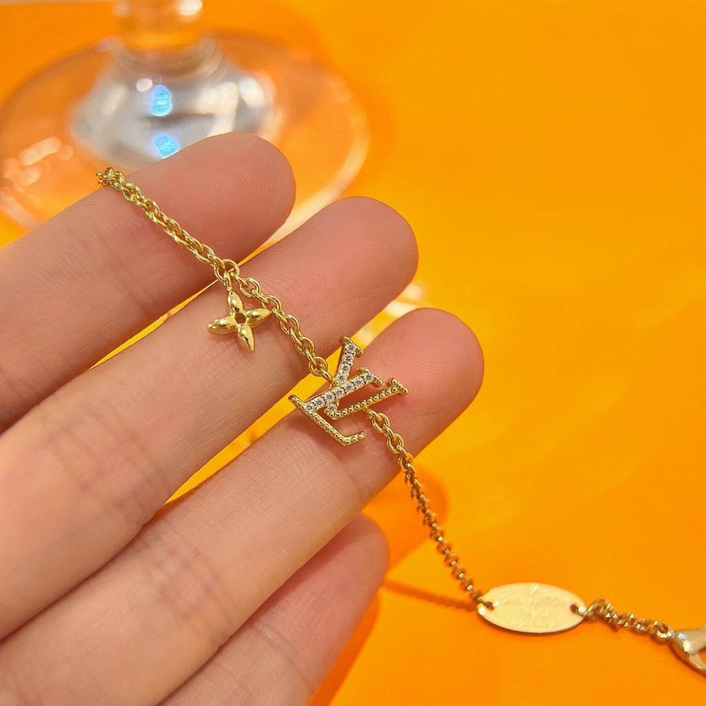「ドリーム」ロゴ 星モチーフ ゴールドブレスレット