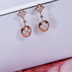 „Dream“ STAR AND SUN PINK GOLD MOP TROPFENOHRRINGE