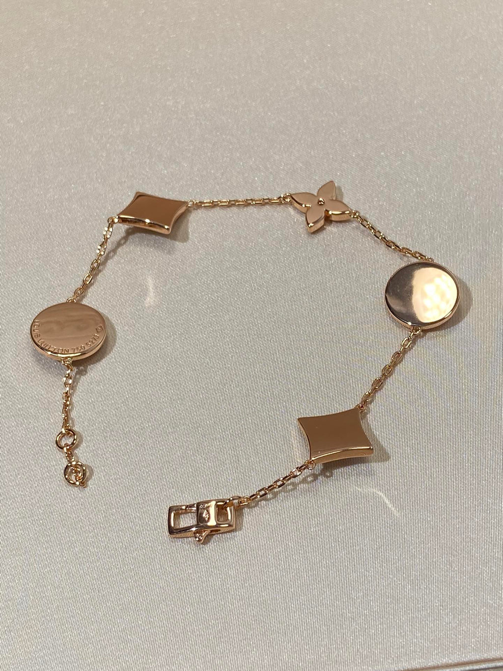 Armband mit 5 Motiven aus Perlmutt, Gold und Sterlingsilber, besetzt mit rosa Zirkonia im Traumstern- und Sonnen-Design