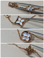 Armband mit 5 Motiven aus Perlmutt, Gold und Sterlingsilber, besetzt mit rosa Zirkonia im Traumstern- und Sonnen-Design