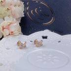 „Dream“-Ohrringe aus Roségold mit Diamanten