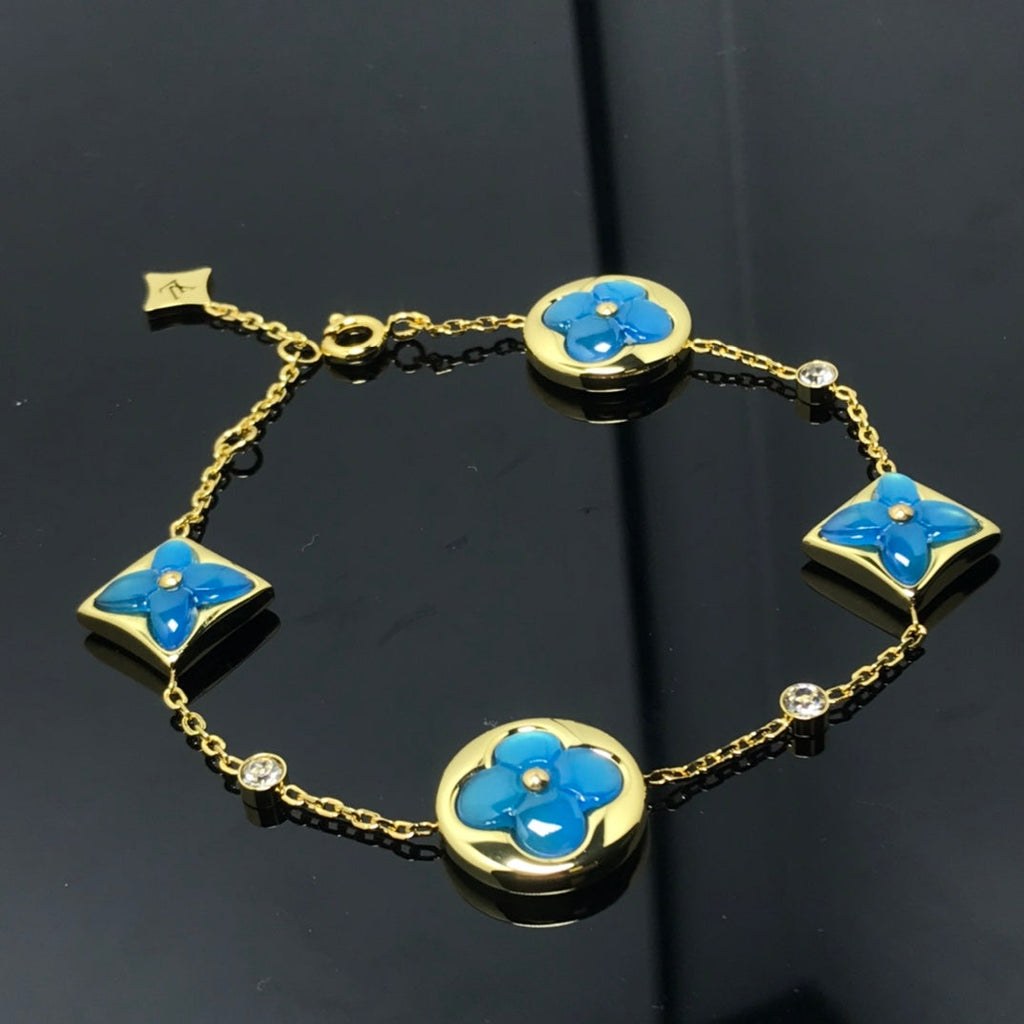 „Dream“-Stern- und Sonnen-Armband mit 4 Motiven, blau