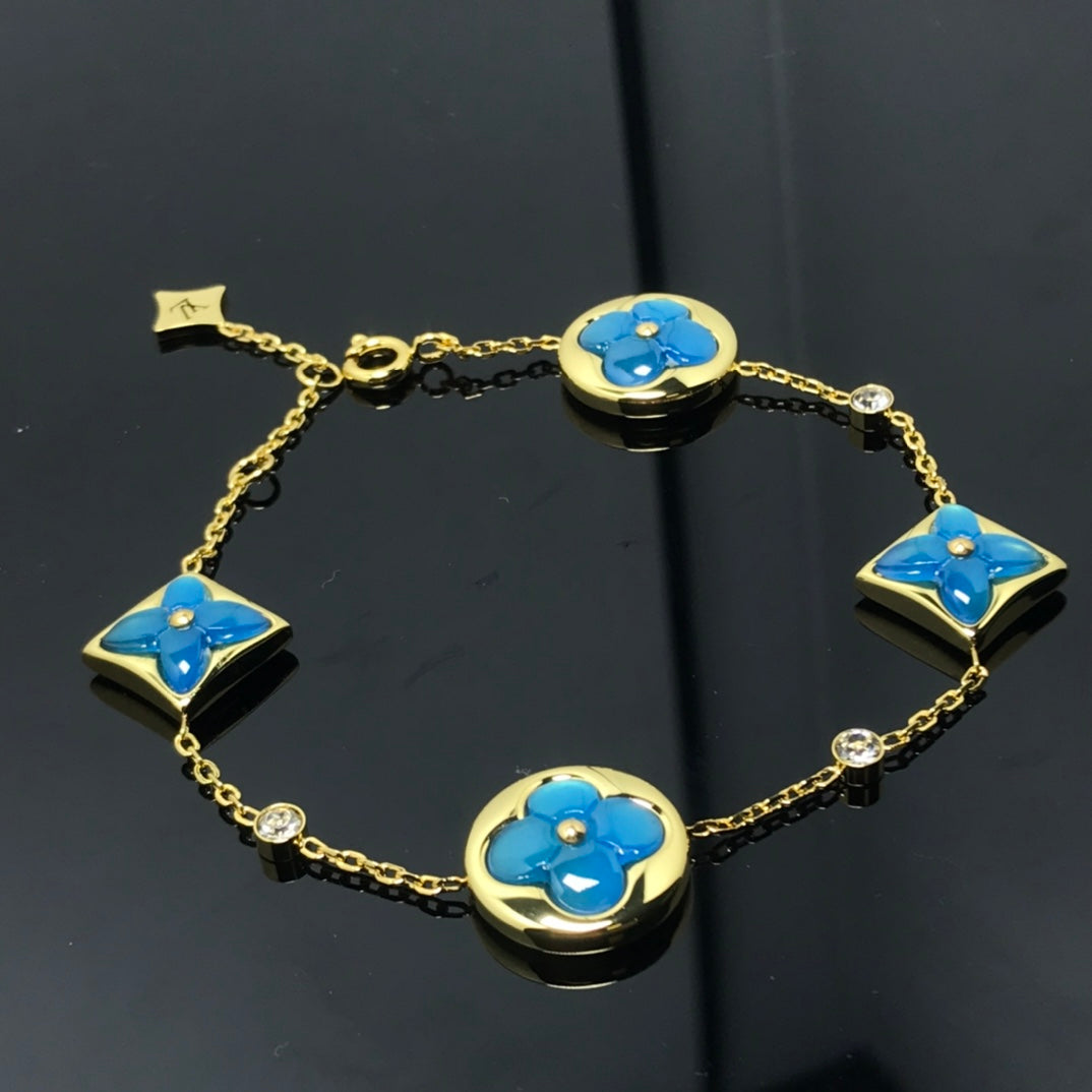 „Dream“-Stern- und Sonnen-Armband mit 4 Motiven, blau