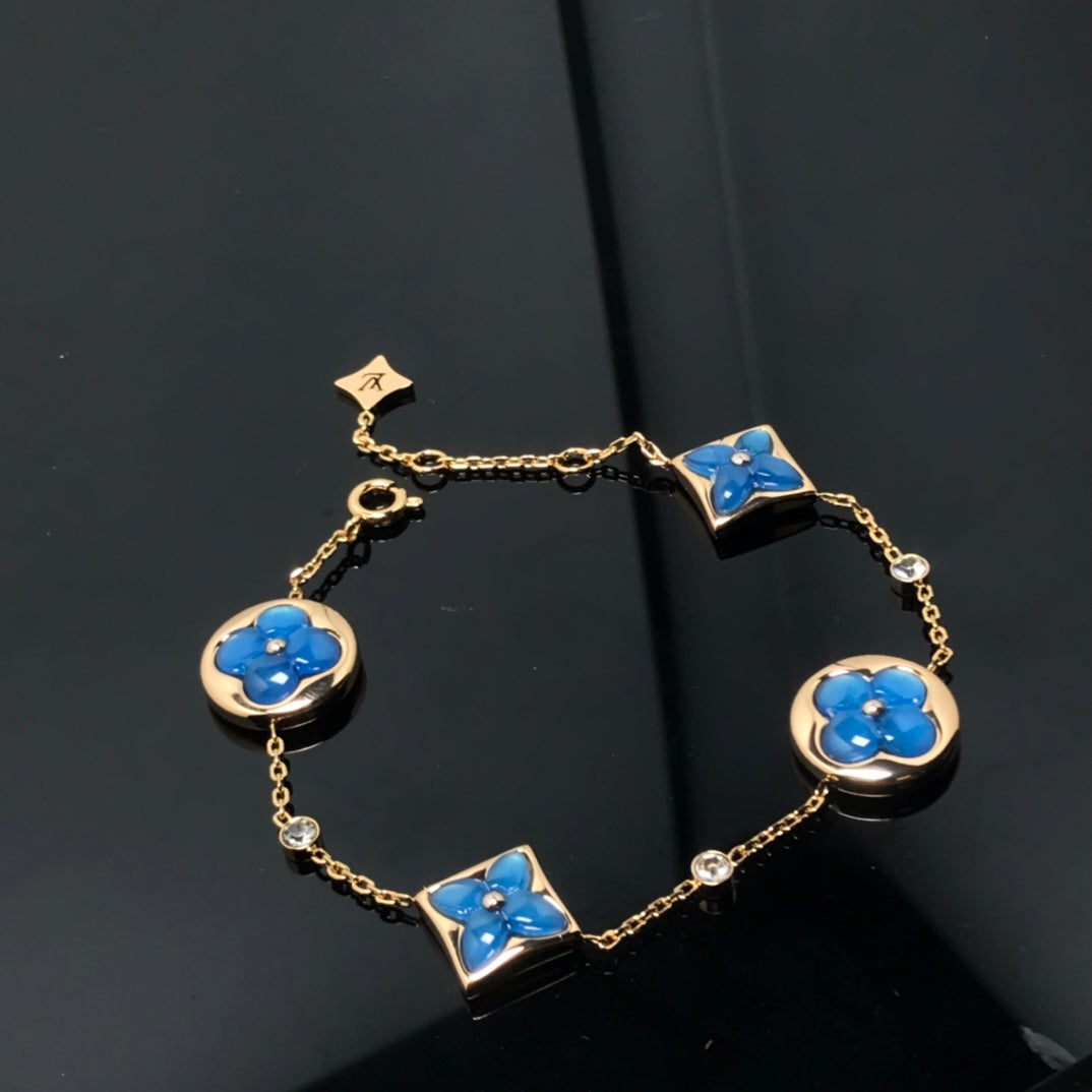 „Dream“-Stern- und Sonnen-Armband mit 4 Motiven, blau