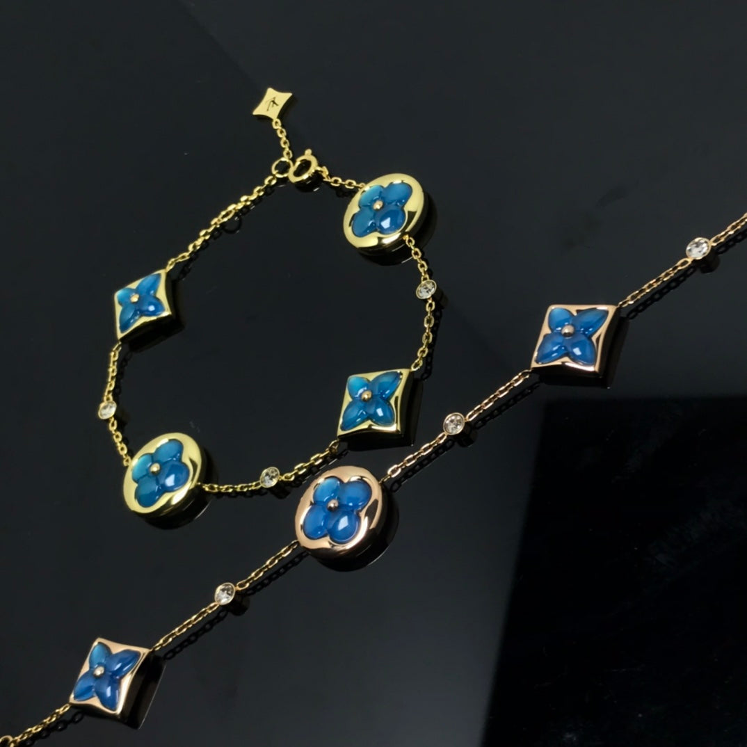 „Dream“-Stern- und Sonnen-Armband mit 4 Motiven, blau